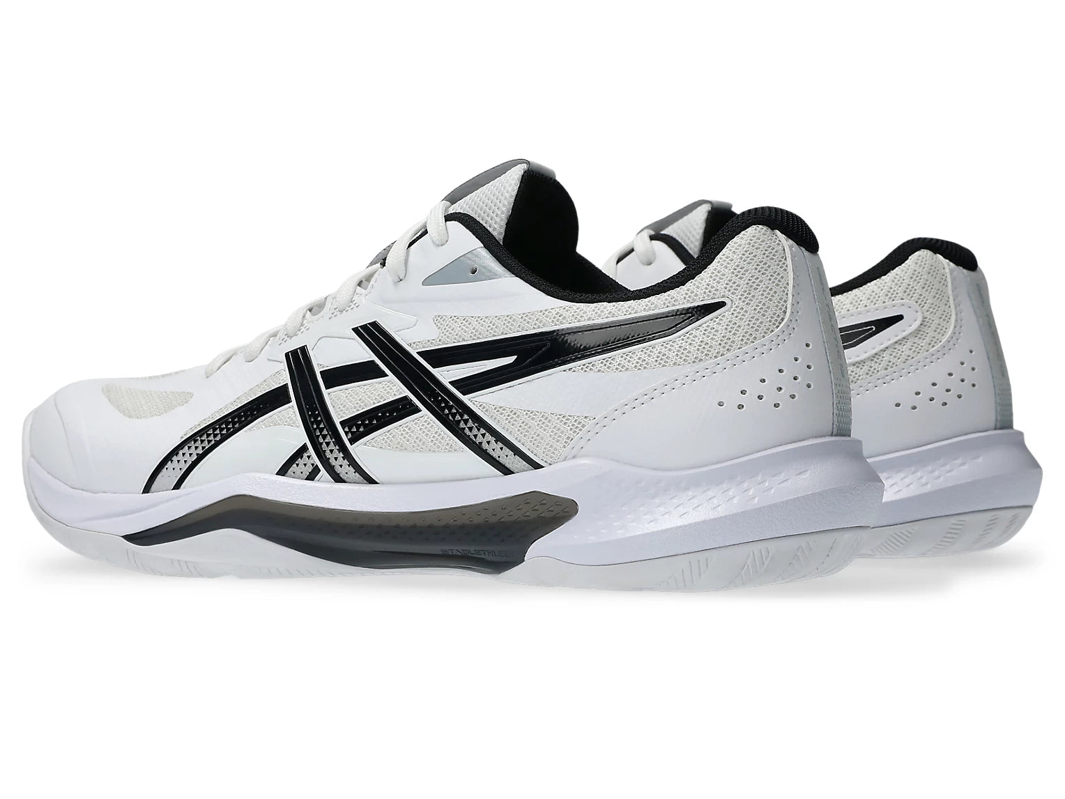 Innebandyaskor Asics Gel-Tactic 13 i vit med svarta detaljer, sidovy och sulkant
